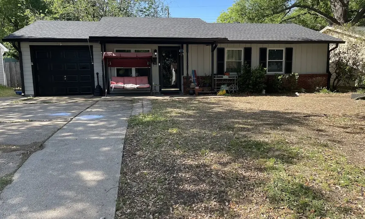 Asphalt Shingle Roof Repair crew at work on a residential roof in Eatonton
